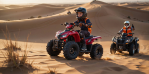 Confident young rider on a 70cc quad bike navigating the golden sand dunes of Dubai with safety gear and instructor supervision