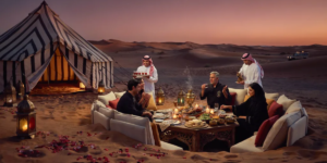 VIP Desert Safari with Quad Bike Dubai – Private Camp Experience VIP desert safari experience with private seating, premium BBQ dinner, and luxury camp setup in Dubai's Lahbab Desert during golden evening